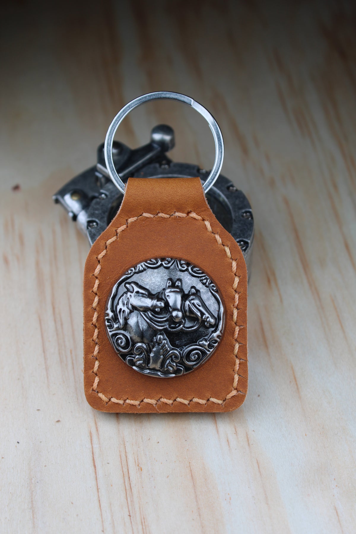 The Three Horses Concho Keychain